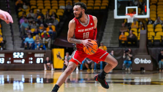 New Mexico Lobos guard Jaelen House (10) looks to pass against the Wyoming Cowboys during the second half at Arena-Auditorium in Laramie, Wyoming, on Feb. 6, 2024.
